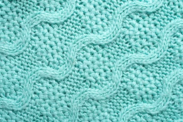 Knitting on turquoise yarn